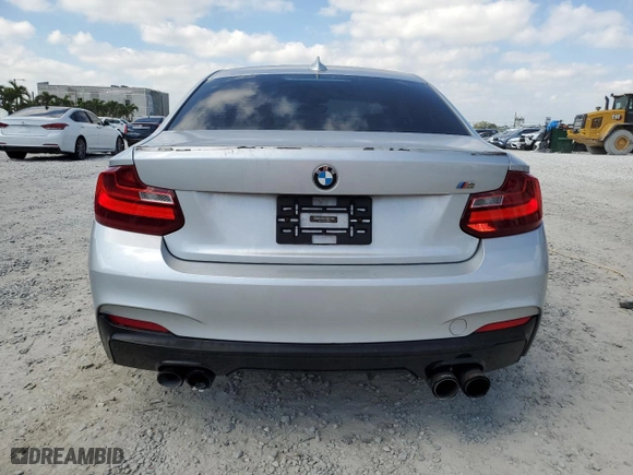 2014 BMW 2 Series M235i with VIN WBA1J7C56EV253025, listed as a Copart auction lot 43221805 with 113,440 mi miles and Salvage Title. Bid and sale history available at carsss.com. Image 6.