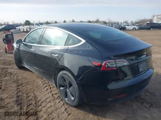 2019 Tesla Model 3 Long Range with VIN 5YJ3E1EB5KF414748, listed as a IAAI auction lot 41778914 with 0 mi miles. Bid and sale history available at carsss.com. Image 3.
