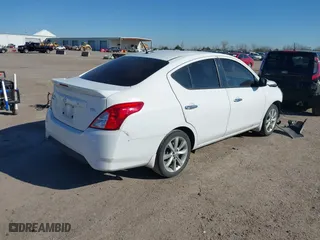 2017 Nissan Versa Sedan SV with VIN 3N1CN7AP4HL845311, listed as a IAAI auction lot 41693054 with 166,157 mi miles. Bid and sale history available at carsss.com. Image 4.