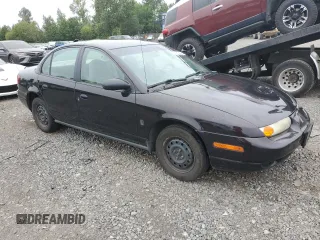 2000 Saturn SL z VIN 1G8ZH528XYZ160128, wystawiony jako Copart lot #64913404 z przebiegiem 172 587 mil mil oraz Czysty tytuł • Clean title. Historia ofert i sprzedaży dostępna na DreamBid. Obrazek 4.