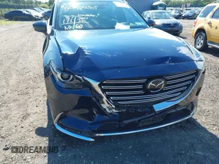 2019 Mazda CX-9 Grand Touring with VIN JM3TCBDY6K0335886, listed as a IAAI auction lot 42704250 with 37,171 mi miles and . Bid and sale history available at DreamBid. Image 6.