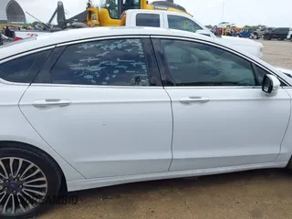 2017 Ford Fusion Titanium с VIN 3FA6P0K9XHR146909, выставлен на аукционе IAAI как лот 42588301 с пробегом 217 885 миль миль и . История ставок и продаж доступна на DreamBid. Изображение 13.