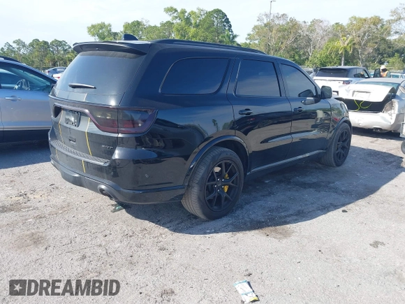 2024 Dodge Durango SRT 392 Premium with VIN 1C4SDJGJ6RC221616, listed as a IAAI auction lot 41280570 with 2,169 mi miles and . Bid and sale history available at DreamBid. Image 4.
