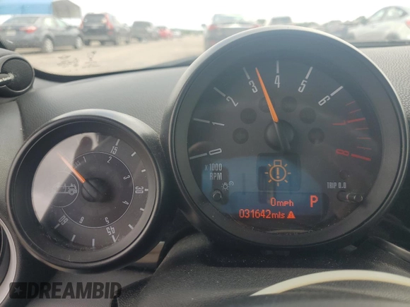 2015 MINI Convertible S with VIN WMWZP3C59F2A91231, listed as a Copart auction lot 59296415 with 31,642 mi miles and Salvage title. Bid and sale history available at DreamBid. Image 9.