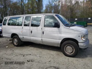 1999 Ford Econoline Passenger XL with VIN 1FBSS31LXXHA39417, listed as a Copart auction lot 52817645 with 109,930 mi miles and Salvage title. Bid and sale history available at DreamBid. Image 4.