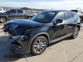 2019 Mazda CX-5 Grand Touring with VIN JM3KFADM2K0545850, listed as a Copart auction lot 88693705 with 118,890 mi miles and Salvage Title. Bid and sale history available at carsss.com. Image 1.