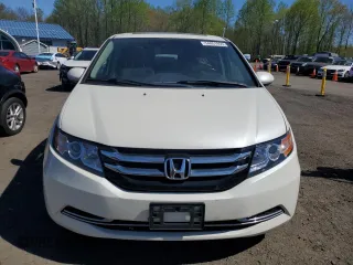 2016 Honda Odyssey EX-L with VIN 5FNRL5H66GB129277, listed as a Copart auction lot 54851955 with 147,496 mi miles and Clean Title. Bid and sale history available at carsss.com. Image 5.