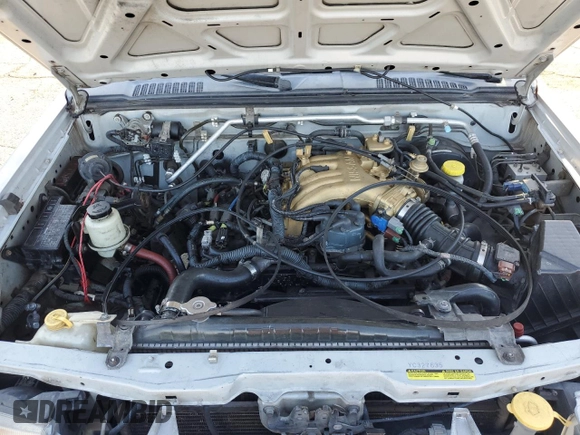 2000 Nissan Frontier XE with VIN 1N6ED26T1YC327635, listed as a Copart auction lot 43149525 with 922,578 mi miles and Salvage title. Bid and sale history available at DreamBid. Image 11.