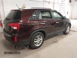 2014 Kia Sorento LX with VIN 5XYKTCA60EG450964, listed as a IAAI auction lot 42039186 with 191,426 mi miles and . Bid and sale history available at carsss.com. Image 4.