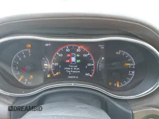 2014 Jeep Grand Cherokee Overland with VIN 1C4RJECG4EC523747, listed as a IAAI auction lot 40802143 with 124,079 mi miles. Bid and sale history available at carsss.com. Image 7.