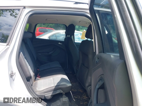 2013 Ford Escape SE z VIN 1FMCU0GXXDUC92917, wystawiony jako IAAI lot #42458117 z przebiegiem 136 006 mil mil oraz . Historia ofert i sprzedaży dostępna na DreamBid. Obrazek 8.