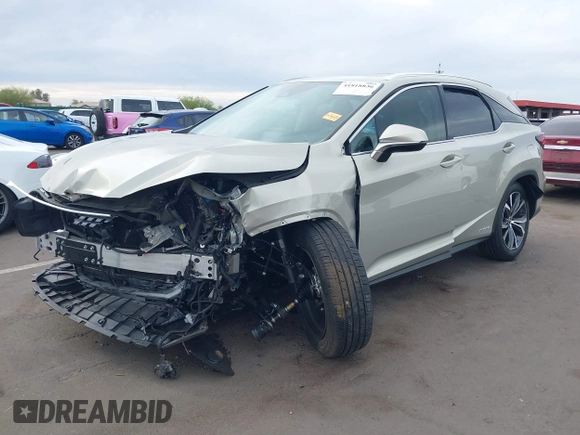 2021 Lexus RX 450h with VIN 2T2HGMDA0MC067228, listed as a IAAI auction lot 41818836 with 28,850 mi miles and . Bid and sale history available at DreamBid. Image 17.