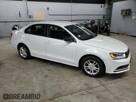 2015 Volkswagen Jetta S with VIN 3VW2K7AJ2FM302752, listed as a Copart auction lot 59302965 with 243,436 mi miles and Clean title. Bid and sale history available at DreamBid. Image 4.