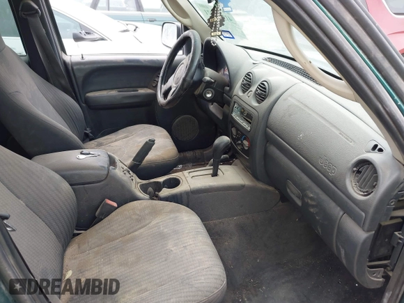 2003 Jeep Liberty Sport with VIN 1J4GL48K13W734113, listed as a IAAI auction lot 41915971 with 206,932 mi miles. Bid and sale history available at carsss.com. Image 5.