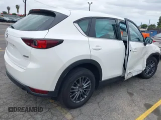 2019 Mazda CX-5 Sport with VIN JM3KFABM4K1565787, listed as a IAAI auction lot 42054585 with 80,580 mi miles and . Bid and sale history available at DreamBid. Image 4.