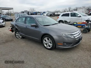 2012 Ford Fusion SE with VIN 3FAHP0HAXCR304720, listed as a Copart auction lot 84213164 with 130,215 mi miles and Salvage Title. Bid and sale history available at carsss.com. Image 4.