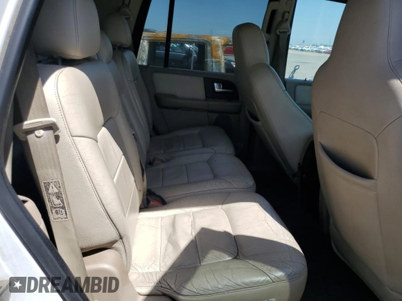 2003 Ford Expedition Special Service z VIN 1FMPU16L53LA07129, wystawiony jako Copart lot #55365635 z przebiegiem 210 660 mil mil oraz Czysty tytuł • Clean title. Historia ofert i sprzedaży dostępna na DreamBid. Obrazek 11.