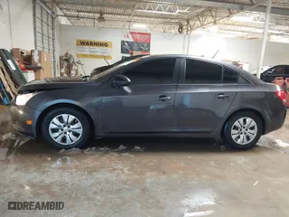 2014 Chevrolet Cruze LS with VIN 1G1PB5SH5E7460979, listed as a IAAI auction lot 41312075 with 123,580 mi miles. Bid and sale history available at carsss.com. Image 14.