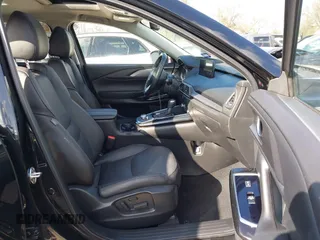 2023 Mazda CX-9 Touring Plus with VIN JM3TCBAY2P0657761, listed as a IAAI auction lot 41125586 with 12,425 mi miles and . Bid and sale history available at DreamBid. Image 5.