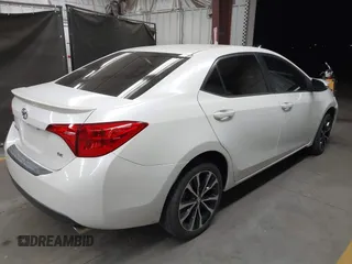2017 Toyota Corolla L with VIN 5YFBURHE7HP693037, listed as a IAAI auction lot 42304020 with 117,710 mi miles and . Bid and sale history available at DreamBid. Image 4.