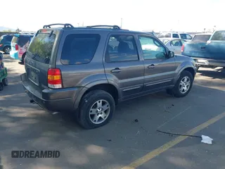 2003 Ford Escape Limited with VIN 1FMCU94173KB02067, listed as a IAAI auction lot 42088659 with 236,209 mi miles. Bid and sale history available at carsss.com. Image 4.