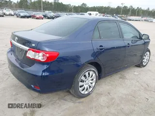 2012 Toyota Corolla L with VIN 5YFBU4EE6CP030641, listed as a IAAI auction lot 41864311 with 102,000 mi miles. Bid and sale history available at carsss.com. Image 4.