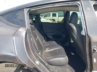 2024 Tesla Model Y with VIN 7SAYGDED2RF040745, listed as a IAAI auction lot 41986613 with 9,778 mi miles and . Bid and sale history available at DreamBid. Image 8.