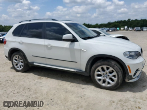 2012 BMW X5 35i с VIN 5UXZV4C58CL987049, выставлен на аукционе Copart как лот 61013925 с пробегом 167 508 миль миль и Чистый • Clean title. История ставок и продаж доступна на DreamBid. Изображение 4.