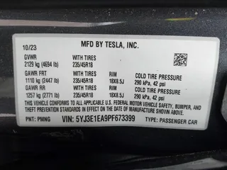 2023 Tesla Model 3 with VIN 5YJ3E1EA9PF673399, listed as a IAAI auction lot 42392643 with 7,571 mi miles and . Bid and sale history available at DreamBid. Image 9.