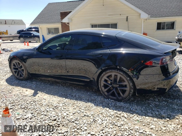 2021 Tesla Model S Plaid with VIN 5YJSA1E63MF451391, listed as a Copart auction lot 54821985 with 50,480 mi miles and Salvage title. Bid and sale history available at DreamBid. Image 2.