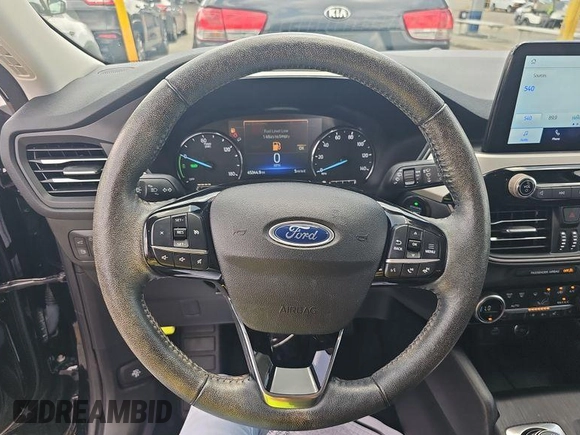 2021 Ford Escape SEL Hybrid with VIN 1FMCU0CZ4MUA54097, listed as a IAAI auction lot 42566428 with 45,342 mi miles and . Bid and sale history available at DreamBid. Image 10.