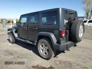 2014 Jeep Wrangler Unlimited Sport with VIN 1C4BJWDG8EL207287, listed as a Copart auction lot 49522335 with 67,472 mi miles and Salvage Title. Bid and sale history available at carsss.com. Image 2.