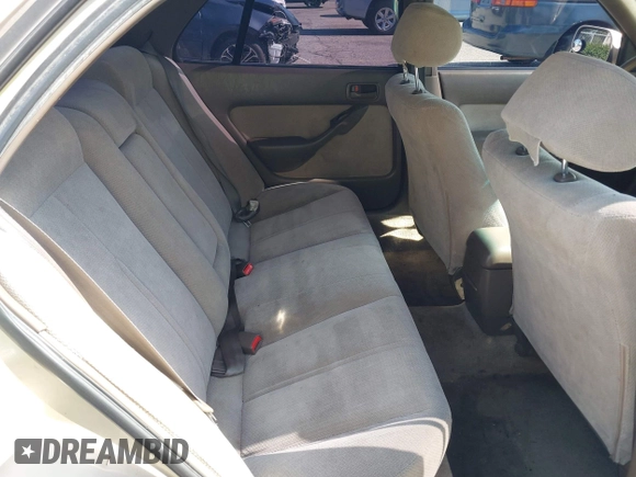 1996 Toyota Camry DX z VIN JT2BG12K0T0347950, wystawiony jako IAAI lot #42248890 z przebiegiem 264 017 mil mil oraz . Historia ofert i sprzedaży dostępna na DreamBid. Obrazek 8.