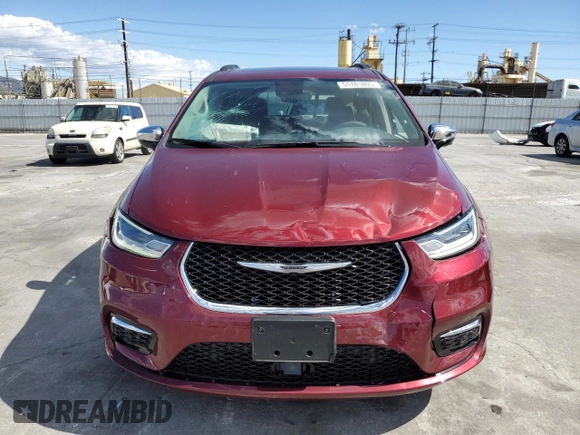 2023 Chrysler Pacifica Limited with VIN 2C4RC3GG9PR605377, listed as a Copart auction lot 51781805 with 7,606 mi miles and Salvage title. Bid and sale history available at DreamBid. Image 5.