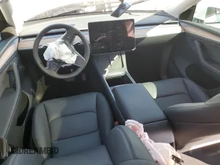 2025 Tesla Model Y Long Range with VIN 7SAYGDED3SA339079, listed as a Copart auction lot 82041424 with 1,793 mi miles and Salvage Title. Bid and sale history available at DreamBid. Image 8.