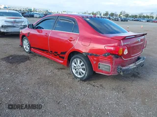 2009 Toyota Corolla with VIN 1NXBU40EX9Z027482, listed as a IAAI auction lot 42149978 with 164,318 mi miles. Bid and sale history available at carsss.com. Image 3.