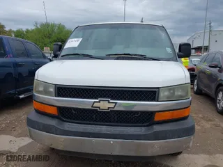 2014 Chevrolet Express Passenger LT with VIN 1GAZG1FG6E1119310, listed as a IAAI auction lot 41913430 with 130,442 mi miles. Bid and sale history available at carsss.com. Image 6.