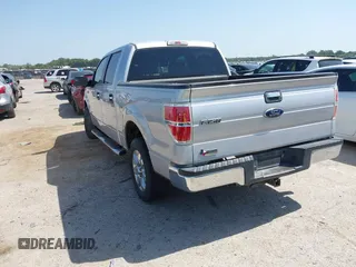 2013 Ford F-150 XL with VIN 1FTFW1CTXDKE02736, listed as a IAAI auction lot 42679036 with 152,895 mi miles and . Bid and sale history available at DreamBid. Image 3.