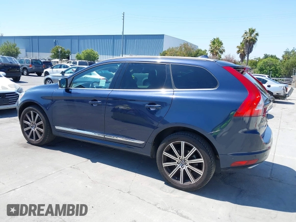 2015 Volvo XC60 T5 Drive-E Premier with VIN YV440MDK0F2685308, listed as a IAAI auction lot 42783695 with 140,561 mi miles and . Bid and sale history available at DreamBid. Image 3.