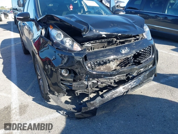 2018 Kia Sportage EX with VIN KNDPN3AC6J7387429, listed as a IAAI auction lot 41833920 with 105,307 mi miles and . Bid and sale history available at DreamBid. Image 6.