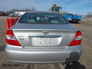 2004 Toyota Camry LE with VIN 4T1BE30K54U828326, listed as a IAAI auction lot 41876818 with 164,876 mi miles. Bid and sale history available at carsss.com. Image 16.
