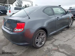 2013 Scion tC with VIN JTKJF5C76D3063500, listed as a IAAI auction lot 41916403 with 146,818 mi miles. Bid and sale history available at carsss.com. Image 4.
