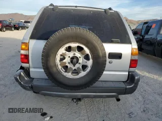 1999 Isuzu Rodeo S with VIN 4S2CK58W2X4361475, listed as a Copart auction lot 63873864 with 232,406 mi miles and Salvage Title. Bid and sale history available at DreamBid. Image 6.