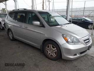 2007 Honda Odyssey EX with VIN 5FNRL38477B432832, listed as a IAAI auction lot 42153673 with 133,652 mi miles and . Bid and sale history available at DreamBid. Image 1.