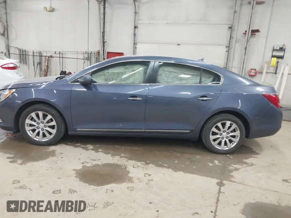 2014 Buick LaCrosse with VIN 1G4GA5GR6EF247407, listed as a IAAI auction lot 42145976 with 55,699 mi miles and . Bid and sale history available at DreamBid. Image 14.