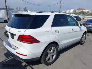 2017 Mercedes-Benz GLE with VIN 4JGDA5HB2HA886289, listed as a IAAI auction lot 42014776 with 132,480 mi miles. Bid and sale history available at carsss.com. Image 4.