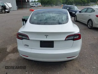 2023 Tesla Model 3 with VIN 5YJ3E1EA4PF644621, listed as a IAAI auction lot 42280312 with 41,262 mi miles and . Bid and sale history available at DreamBid. Image 16.
