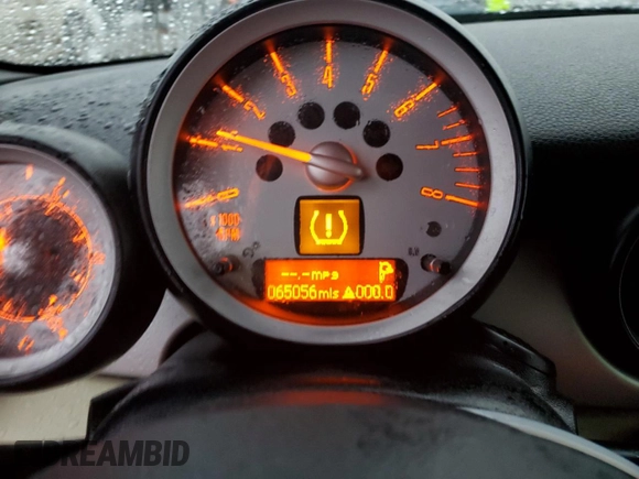 2009 MINI Convertible with VIN WMWMR33539TU96291, listed as a Copart auction lot 83849744 with 65,056 mi miles and Salvage title. Bid and sale history available at DreamBid. Image 9.