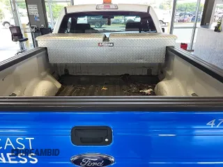 2012 Ford F-150 XL with VIN 1FTMF1CF0CKD99099, listed as a IAAI auction lot 42843824 with 119,929 mi miles and . Bid and sale history available at DreamBid. Image 5.