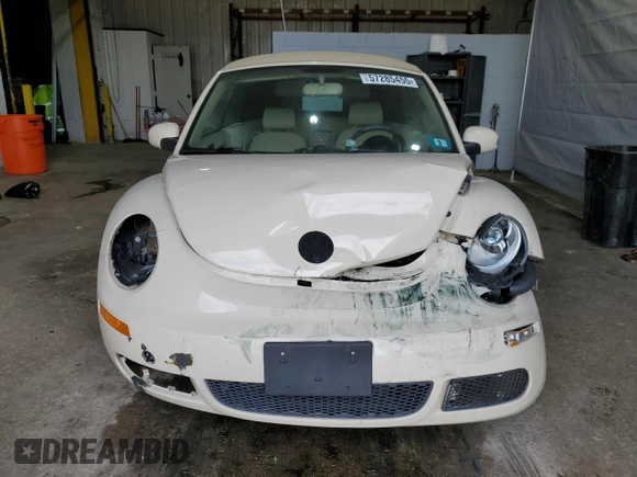 2009 Volkswagen Beetle S with VIN 3VWRG31Y39M402031, listed as a Copart auction lot 57285455 with 101,220 mi miles and Salvage title. Bid and sale history available at DreamBid. Image 5.
